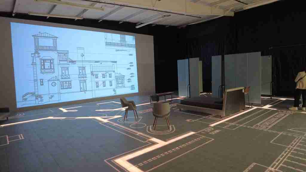1:1 scale version of a walkable floor plan on an LED screen