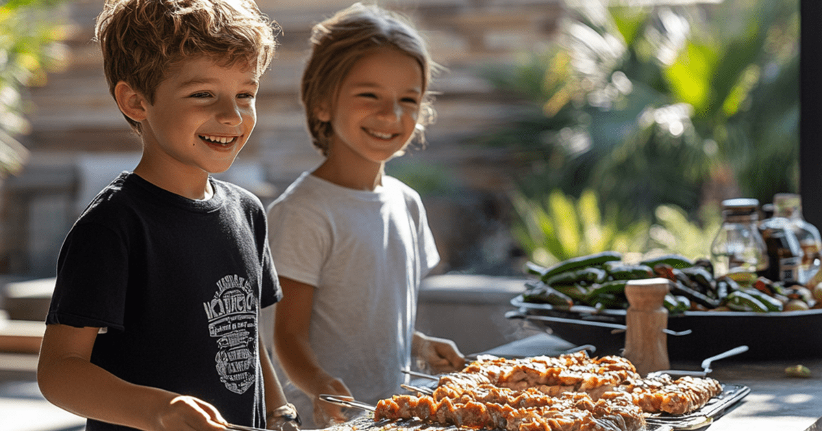 family enjoying BBQ at the outdoor kitchen design